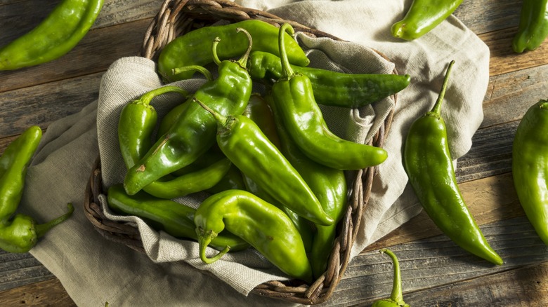 Hatch chiles in wicker basket lined with linen