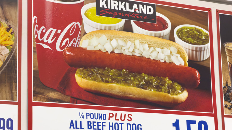 The signage of a Costco's food court hot dog combo