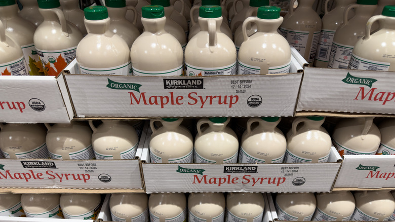Rows of stacked Costco Kirkland Signature maple syrup