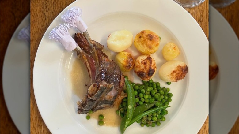 A lamb chop with manchette on the end.