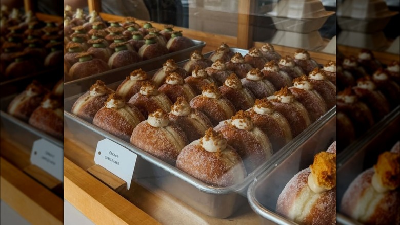 The specialty Carrot Cheesecake brioche donuts on display at The Flour Box in Seattle, Washington.