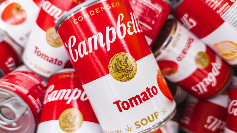 A pile of Campbell's tomato soup cans