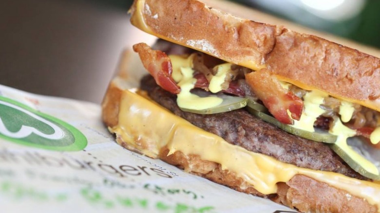 A Wahlburgers burger featuring government cheese