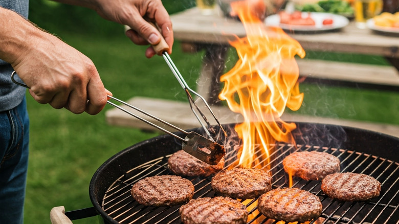 burgers on a charcoal grill