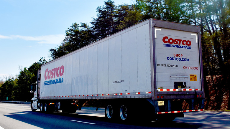 A Costco truck on a rural highway