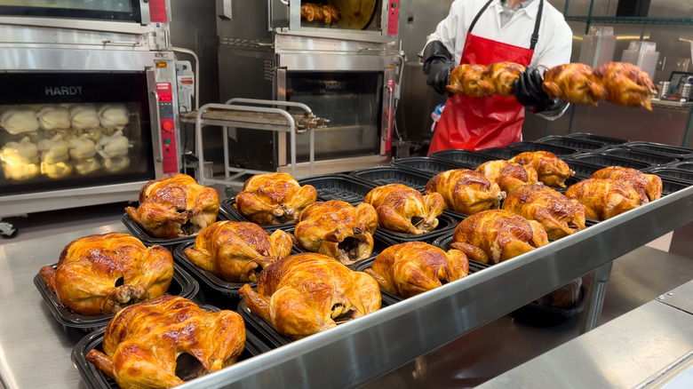 Costco rotisserie chickens sit in open containers