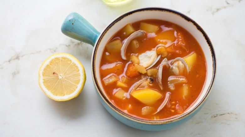 An overhead shot of Manhattan clam chowder.