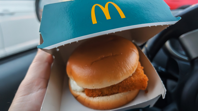 A Filet-O-Fish from McDonald's inside its blue box.