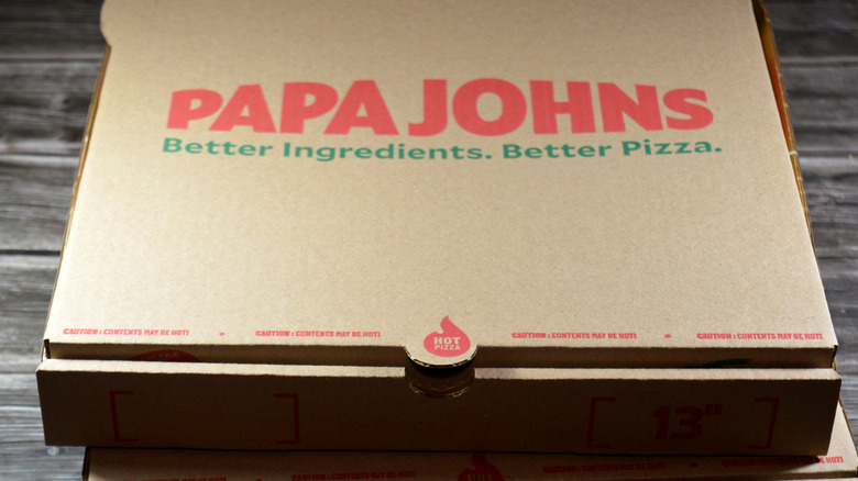 Boxes of Papa Johns pizza boxes
