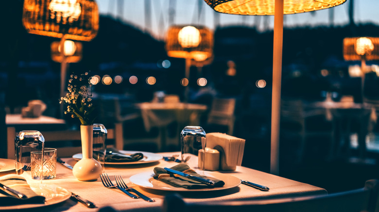 An elegant dinner setting with mood lighting