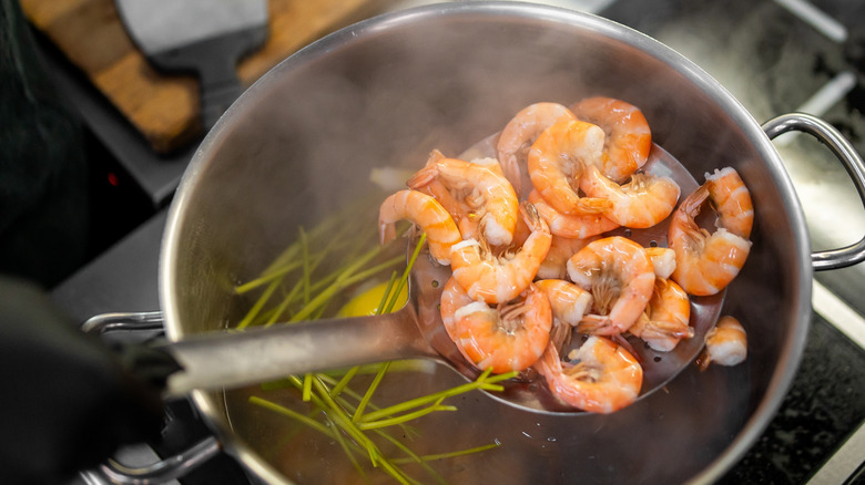 shrimp poached in stock pot