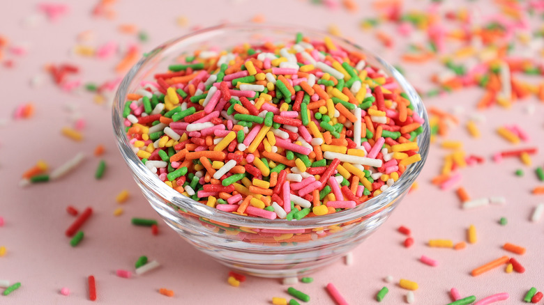 Small glass bowl of multi-colored sprinkles