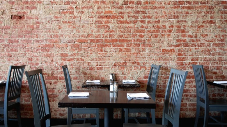 A restaurant with trendy exposed brick walls.