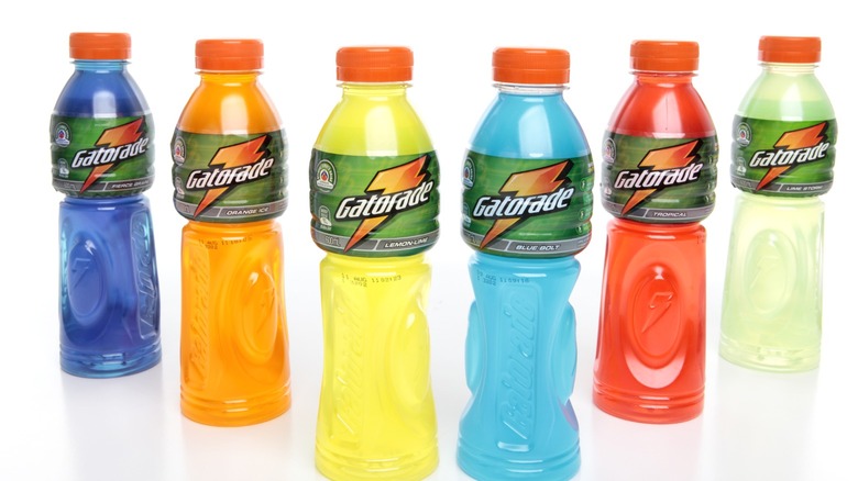 Six bottles of Gatorade arranged for a picture.