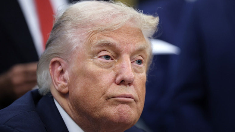 Donald Trump frowning slightly