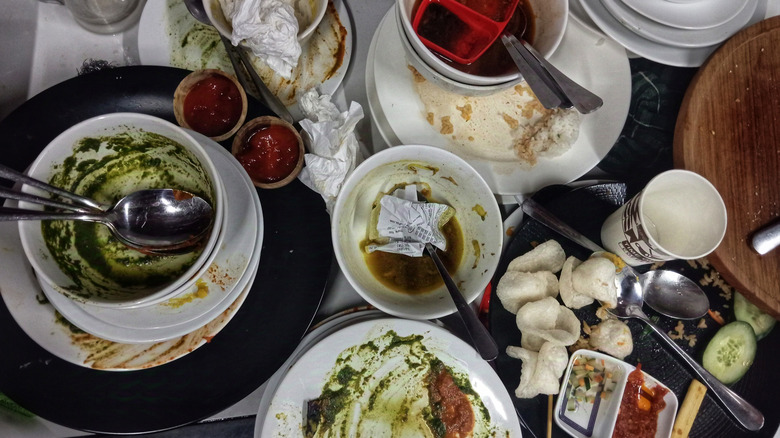 Dirty dishes on a restaurant table