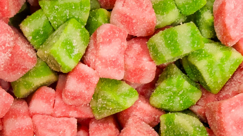 A closeup of assorted watermelon candies in a pile.
