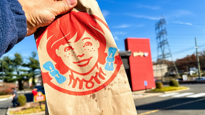 Wendy's bag outside of the restaurant