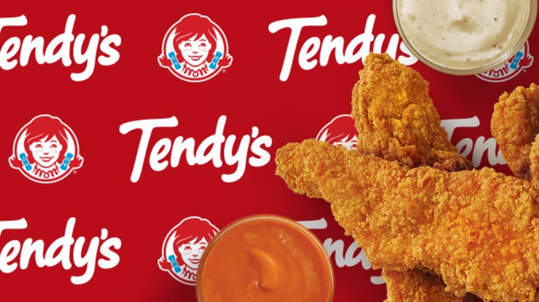 Wendy's logo written "Tendy's" with chicken tenders and sauces