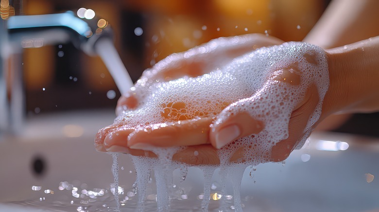 Person washing their hands
