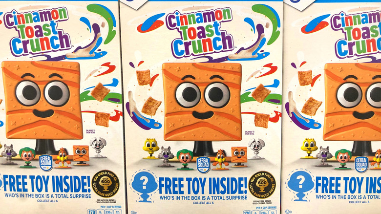 Three boxes of Cinnamon Toast Crunch offering a free toy