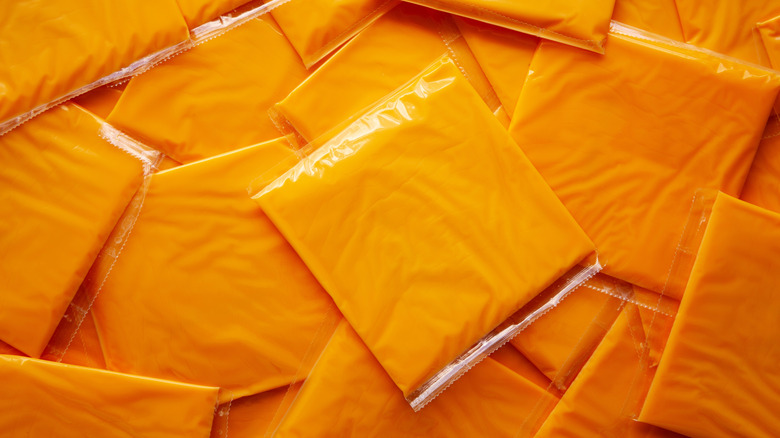 Wrapped American cheese slices in a pile