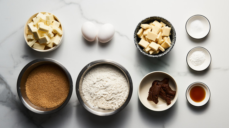 Various small bowls with ingredients for miso blondies
