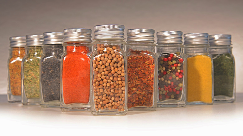 dry spices in small glass jars