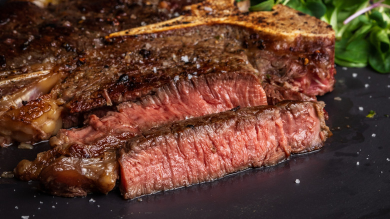 A medium-rare steak on a plate