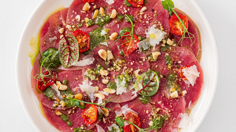 Beef carpaccio on a white plate
