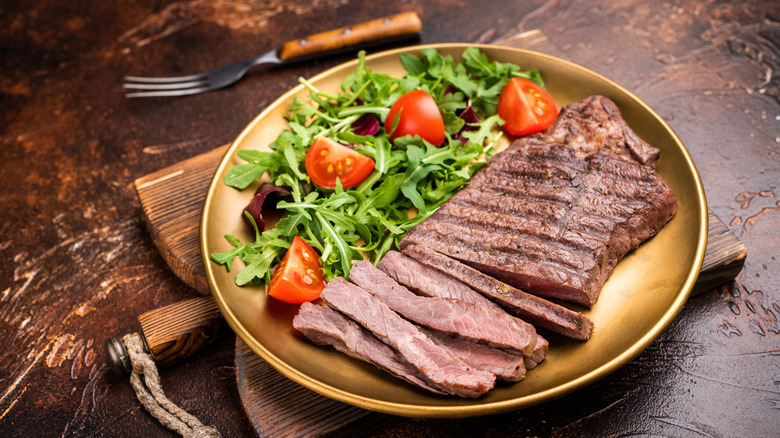 Dry-aged steak strips with salad
