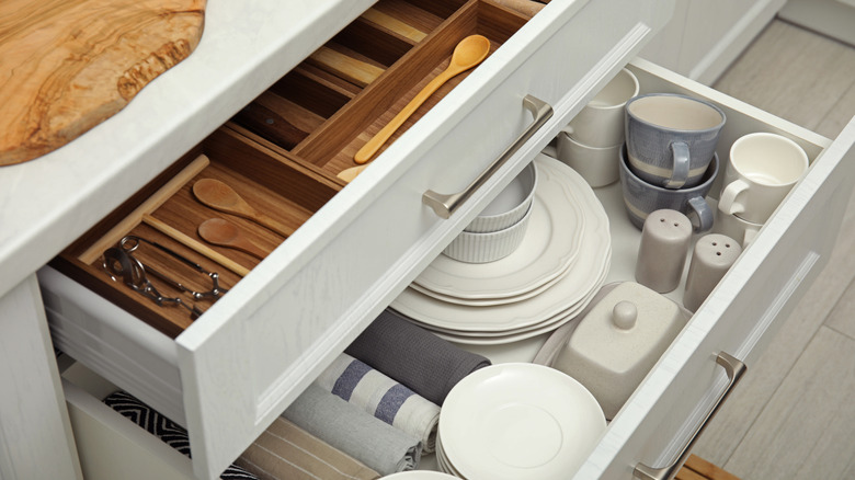 Two open kitchen drawers