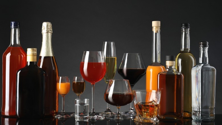 An assortment of liquors, including wine and bourbon.