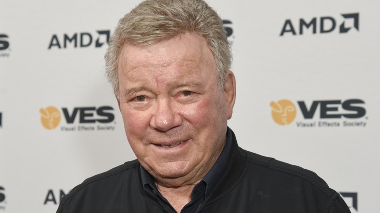 William Shatner posing for photograph