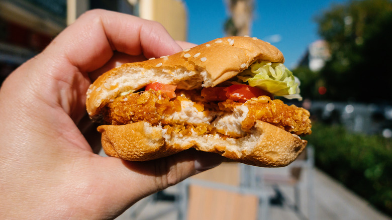 chicken sandwich with bite taken out