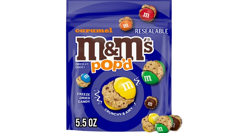 Resealable bag of M&M's Pop'd candy on a white background.