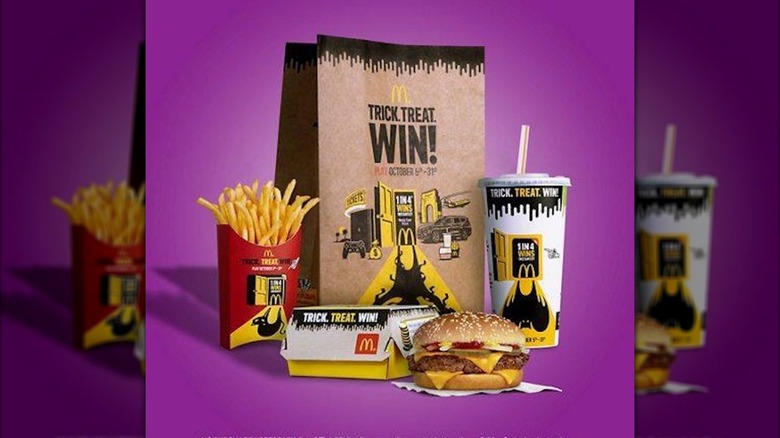 McDonald's meal with a burger, fries, and drink in Trick. Treat. Win! packaging