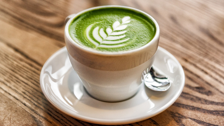 Matcha latte on wooden table