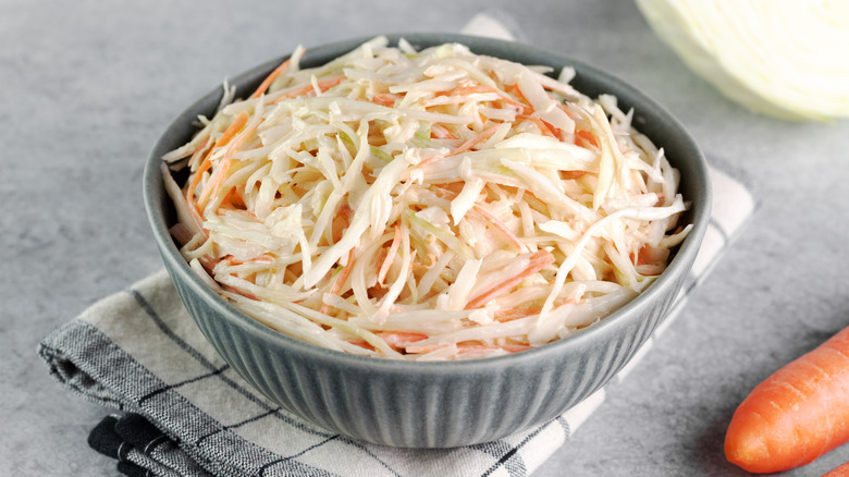 Bowl of classic creamy coleslaw with carrots and cabbage