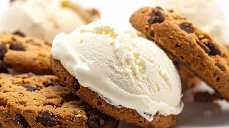 Chocolate chip cookie with scoop of vanilla ice cream on top