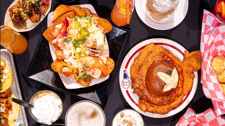 Various foods and drinks on table from the Big E fair