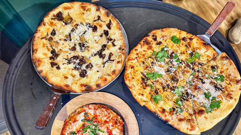Different pizzas from Iron & Grape
