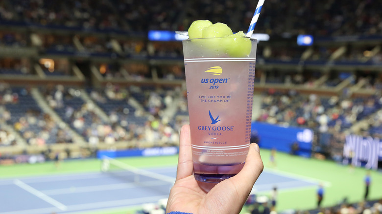 hand holding Honey Deuce cocktail at US OPen tennis tournament