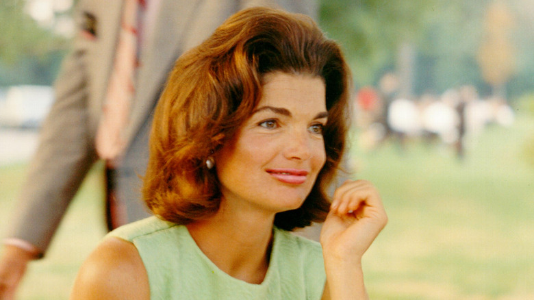 early '60s Jackie Kennedy in an outdoor setting