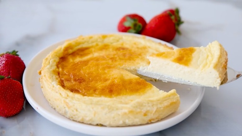 Cottage cheese cake with a slice cut out