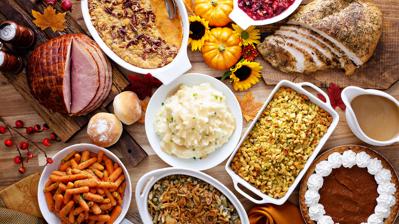 Assortment of Thanksgiving foods on a wooden table