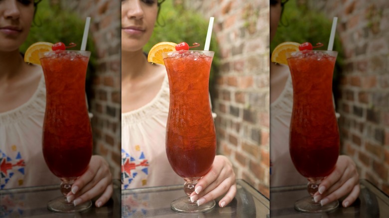 A hurricane glass filled with a cocktail