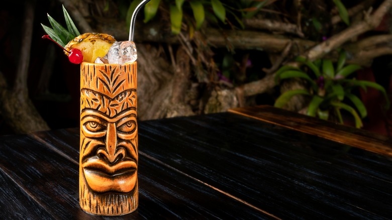 A tiki mug on a bar