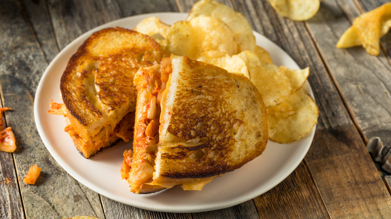 A kimchi grilled sandwich served on a plate.