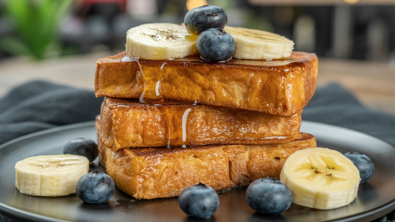 French toast, banana slices, and blueberries